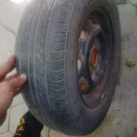 یک حلقه لاستیک پراید همراه با رینگ مارک دنال