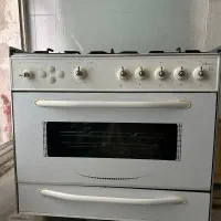 اجاق گاز فر دار به همراه جوجه گردان