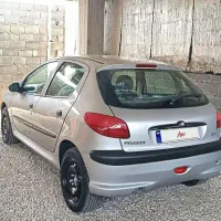 سواری پژو ۲۰۶ بی رنگ