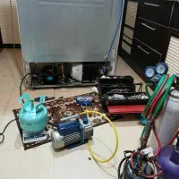 تعمیرات تخصصی یخچال فریزر ساید بای ساید در محل