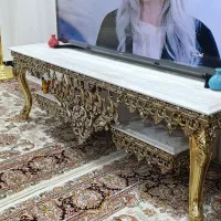 بوفه .میز تلویزیون .پرده .