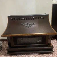لوازم خانه شومینه میز چوبی کرسی کپسول
