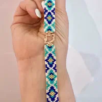 دستبند میوکی همراه با پلاک طلا