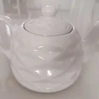 قوری آناناسی در دو رنگ نقره ای و سفید کاملا نو