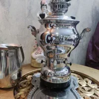 سماور گازی و آینه و میز غذا خوری