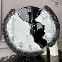ساعت دیواری رزینی.طرح دفرمه سایز60 پس کرایه
