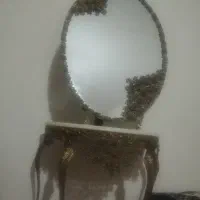 آینه و شمعدان وساعت برنز سنگین هست