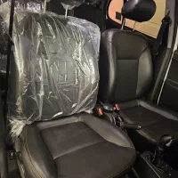 روکش صندلی کوئیک مشکی نوار قرمز پارچه ای