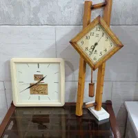 ساعت دیواری و قاب وگل تزیینی