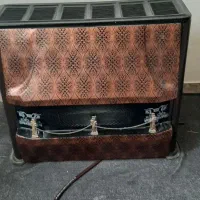 بخاری وفرش وتابلو برق در حد نو