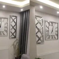 ساعت دیواری آینه ای