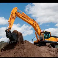 خاکبرداری توسط بابکت مینی بیل بادسان