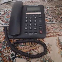 تلفن گوشی وماشین حساب