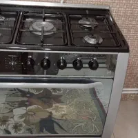 اجاق گاز  و میز تلویزیون