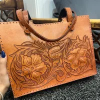 کیف چرم طبیعی حکاکی شده و کار دست