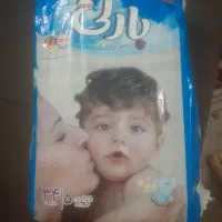 پوشک بچه سایز ۵ و ۶ و صندلی توالت کودک