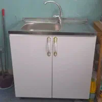 یک عدد کابینت سینگ دار به همراه شیر و شیره تسویه