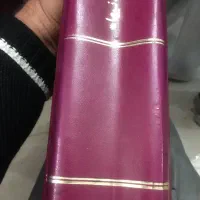 دستگاه قدیمی و کتاب قدیمی