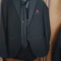 یک دست کت و شلوار