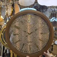 ساعت دیواری چرمی قهوه ای برند کوروم قطر ۶۰