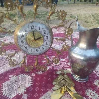 ساعت برنجی ویک پارچ برگ برنجی چهار عدد هم پروانه