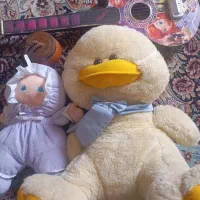 عروسک و گیتار و جای بدلی جات چوبی
