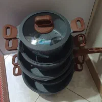 قابلمه ده پارچه کف چدن بدنه سرامیک زد خش خارجی