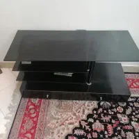 میزتلویزیون شیشه ای کارکرده