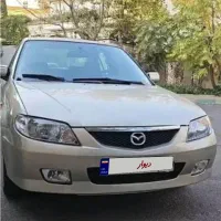 مزدا ۳۲۳ نقره‌ای مدل ۱۳۸۵ تیپ ۴