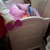 گهواره کنار تخت مادر