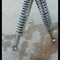 کمک عقب موتورسیکلت