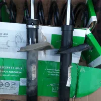 کمک جلوی پژو و فنر لول