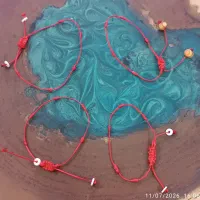 دستبند هفت گره رد استرینگ