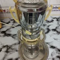 سماور برقی .دکمه اتومات .