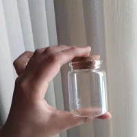 ظرف شیشه ای با درب چوب پنبه