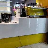 دستگاه اسپرسو‌ ساز و آسیاب قهوه
