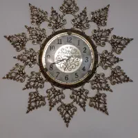 ساعت و گل و گلدان برنز