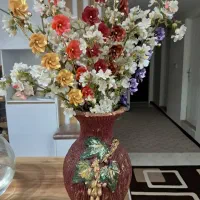 گلدان سفالی تزیینی با گل مصنوعی