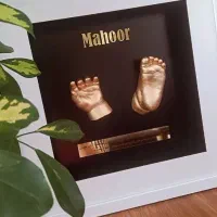 تابلو مجسمه دست و پا کودک تندیس زوج و کودک