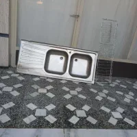 سینک دو قلو و آب چکان
