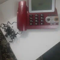 دستگاه  تلفن ویک عدد ماله گچ کاری