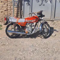 موتور 125به رنگ نارنجی موتور سالم باک صندل نو