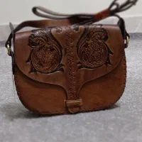 کیف چرمی حکاکی شده