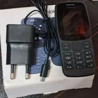 گوشی نوکیا 105 به همراه قاب اضافه صورتی در حد نو