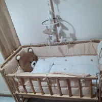 تخت کنار مادر چوب