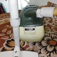 جارو برقی قدیمی ژاپن  و دوربین قدیمی
