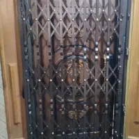 حفاظ آکاردئونی درب خانه