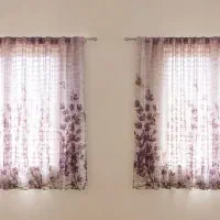 پرده حریر گلدار بنفش