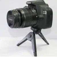 کنون eos d1200 با لنز 18/55و یک لنز و باتری اضافه