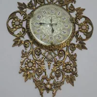 ساعت برنز وگلدان برنز